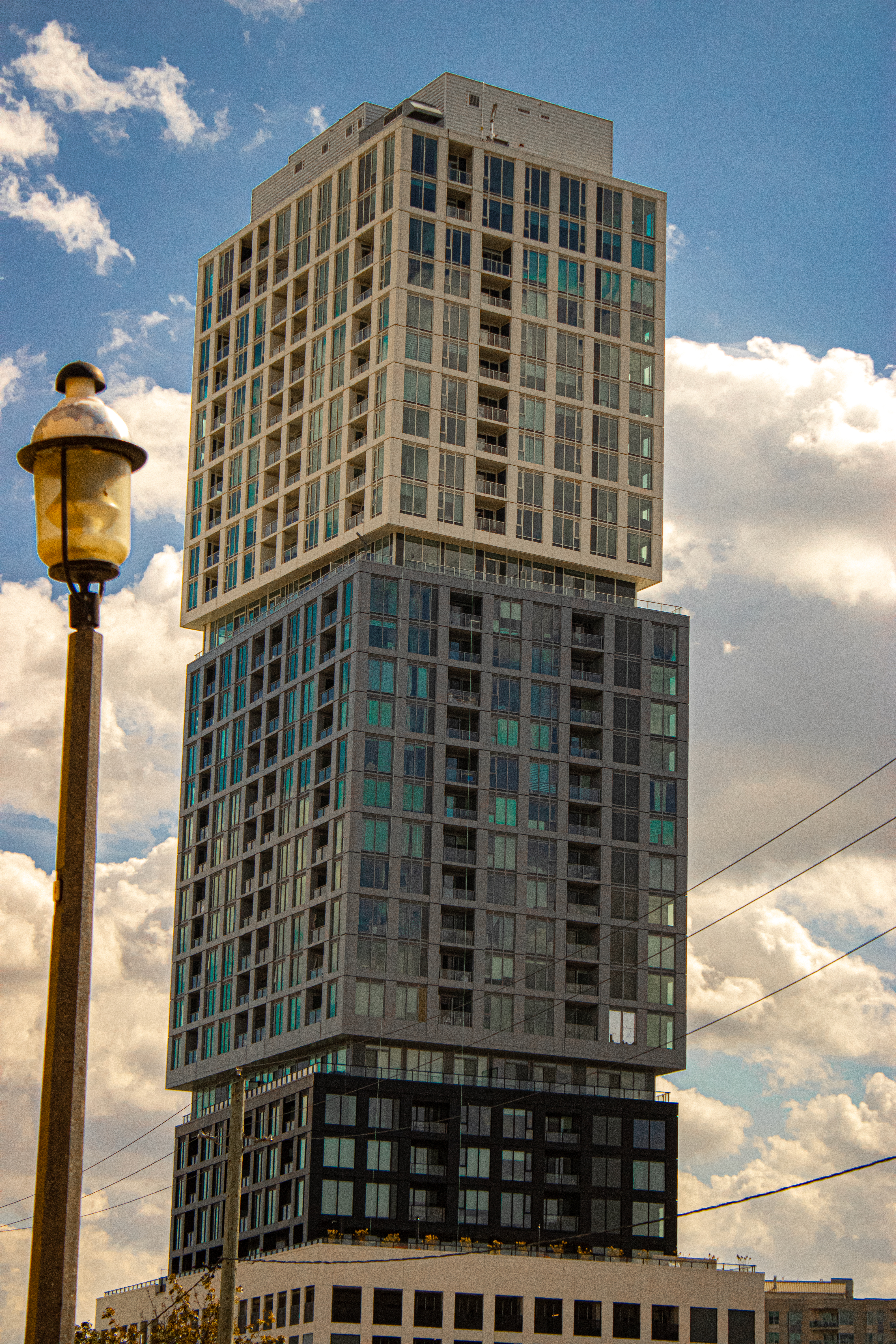 High-rise tower against blue sky
